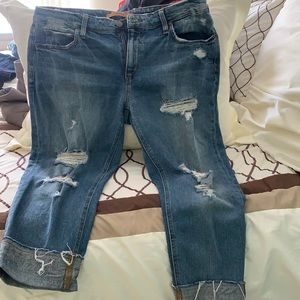 Joe’s ripped Capri shorts